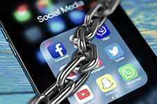 Chained-Social-Media-Facebook-Twitter-YouTube-Regulations-Internet-900